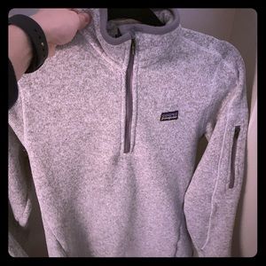 Women’s Patagonia quarter zip.